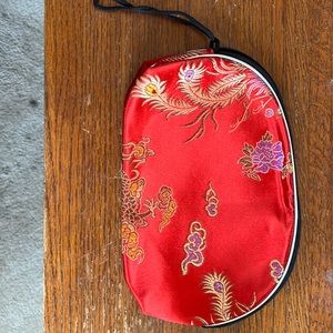 Red silk purse with wrist string, never used